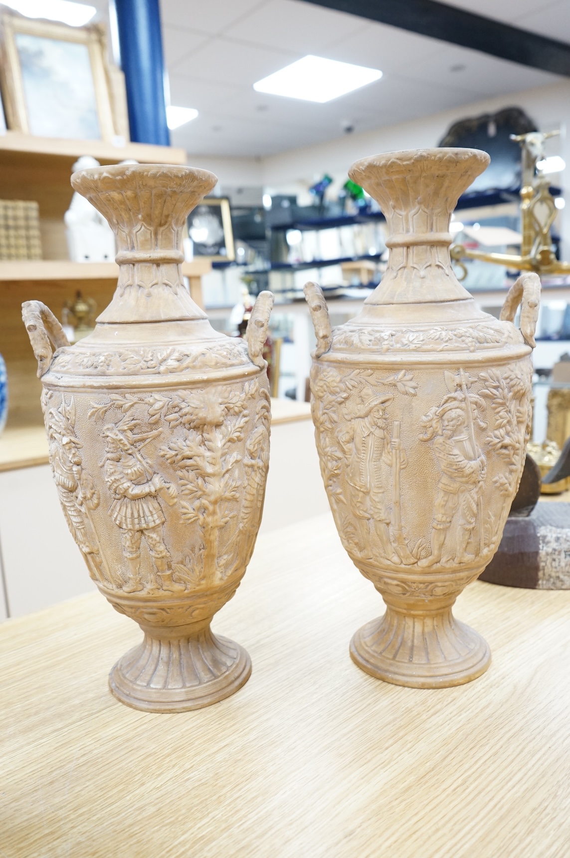 A pair of Grand Tour plaster two handled neoclassical revival vases H 43cm x 20cm